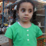 A young lady I met that was fascinated by the pigeons.