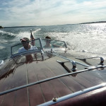Riding in a vintage speedboat!
