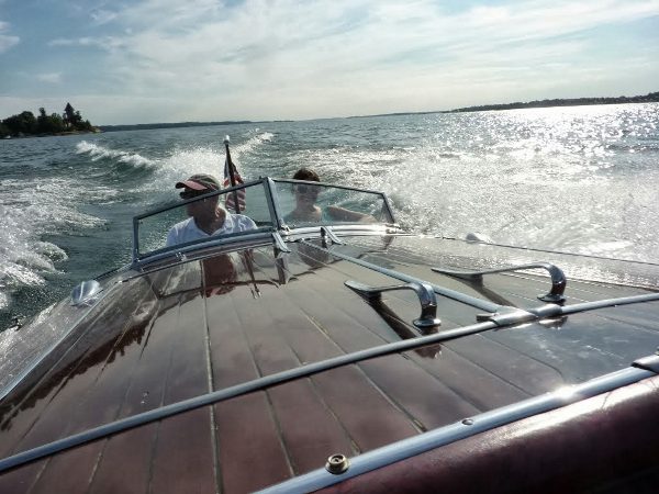 Riding in a vintage speedboat!