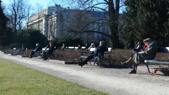 Enjoying the sun and green grass in Warsaw.