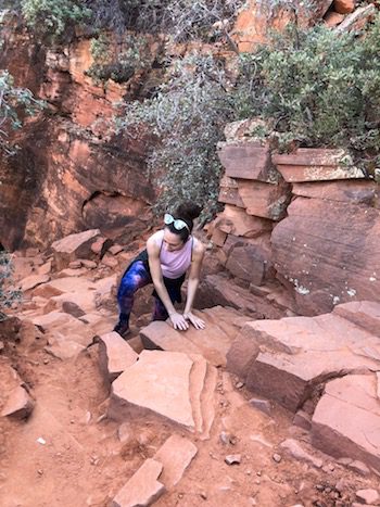 Lori Yearwood crawling up a steep section of trail in Boynton Canyon. 