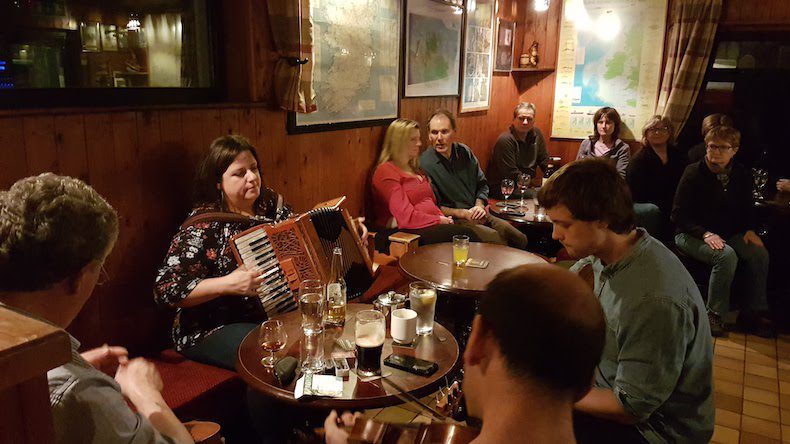 Musicians playing Irish tunes in the bar at the Doonmoor Hotel on Inishbofin Island.