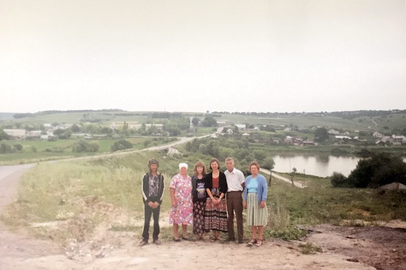 Writer's immediate and some of her extended family in Ukraine, wearing a mixture of Polish attire and Western clothing..