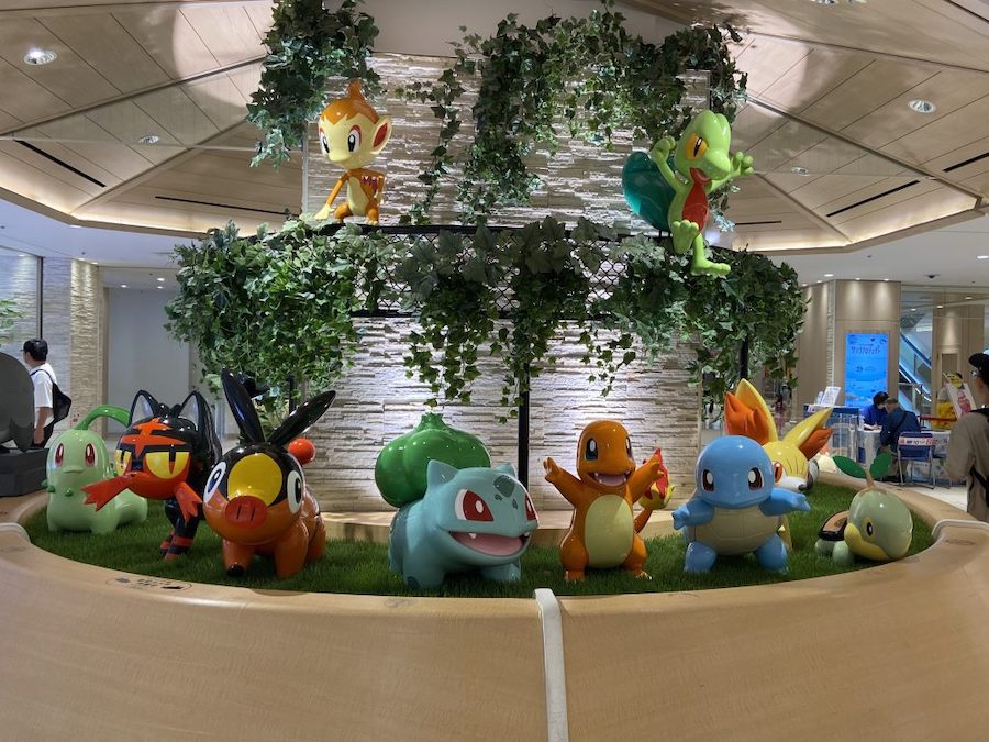 A gathering of Pokemon inside Pokemon Center Mega Tokyo