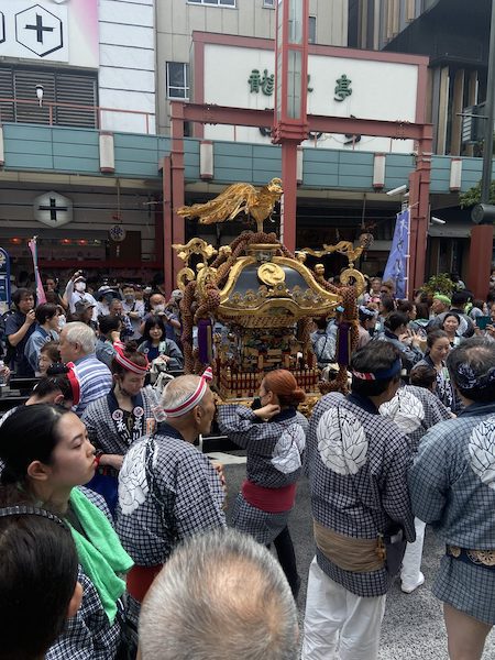 Mikoshis (portable shrines) being carried during Sanja Matsuri.