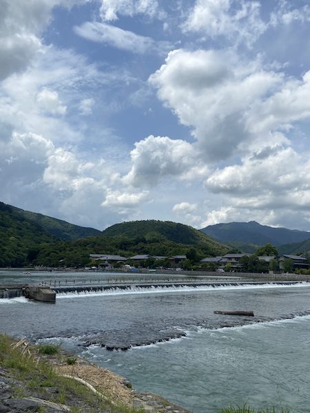 View of 2-3 story buildings Kirizuma roofs with across the Katsura River