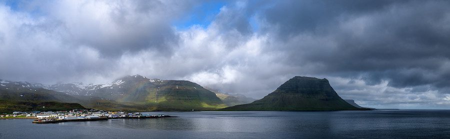 The village of Grundarfjordur and Kirkjufell mountain, as seen from the harbour.