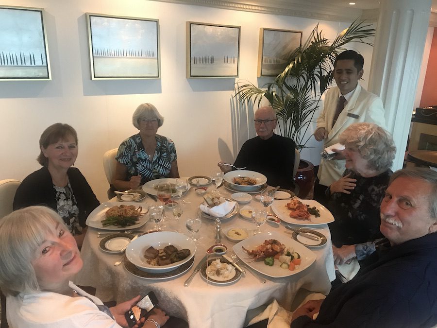 Anne and Vera enjoying another fabulous meal on the Oceania Insignia, with fellow passengers.