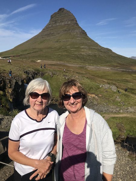 Vera and Anne with Kirkjufell mountain in the background.