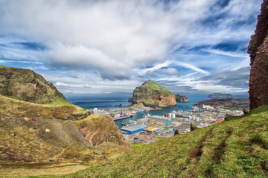 Looking down on the seaside town of Vestmannaeyjabær on the island of Heimaey, the largest island in the Icelandic archipelago of Vestmannaeyjar.