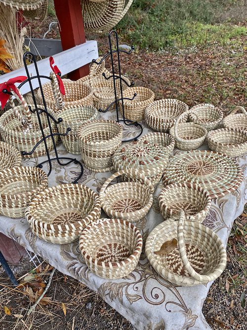 Sweetgrass baskets at a roadside stand.