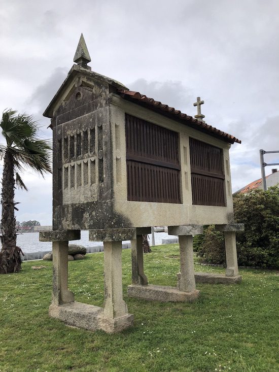 A large horreo or granary with the typical cross at one end and a phallic symbol at the other.