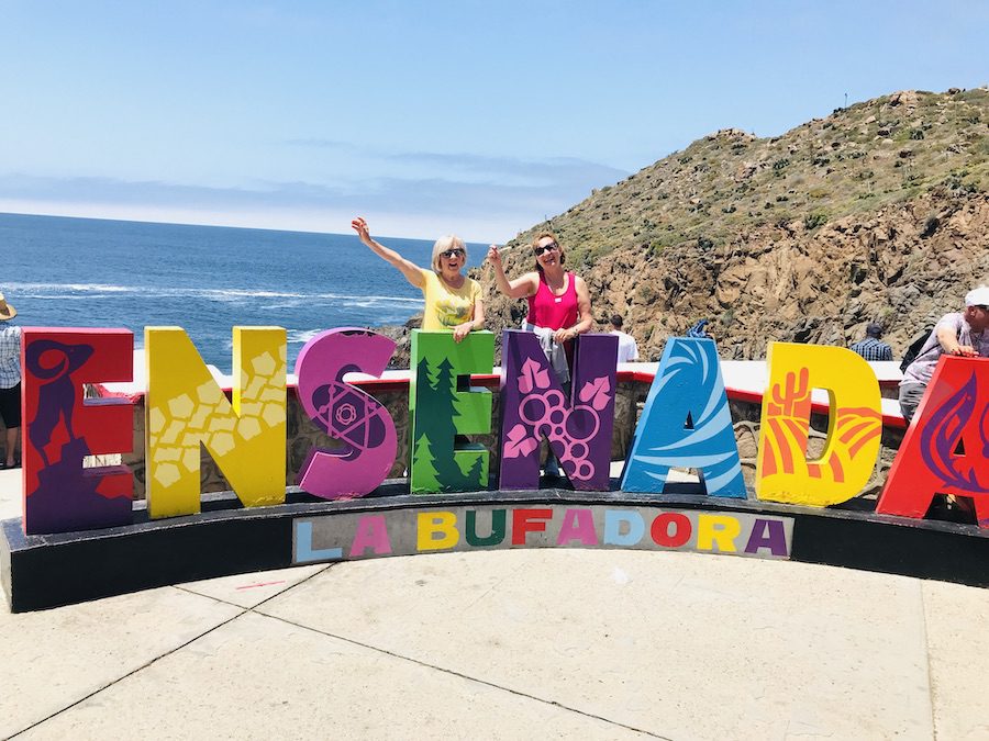 Veera and Anne at the Ensenada sign at La Bufadora