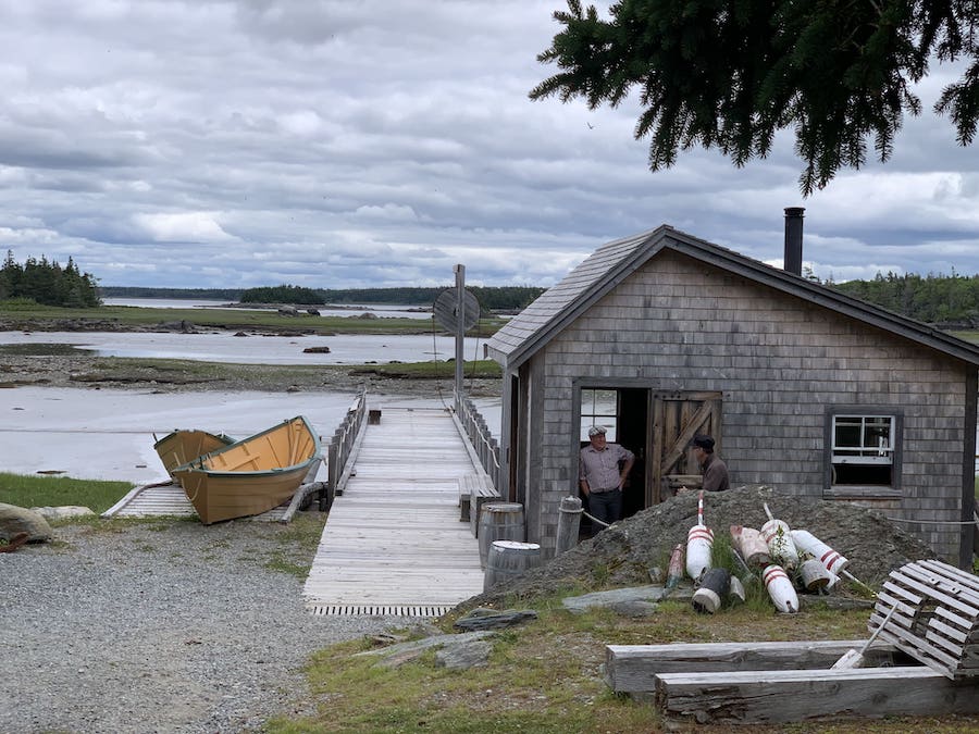 Fishermen in period clothing at Historic Acadian Village of Nova Scotia