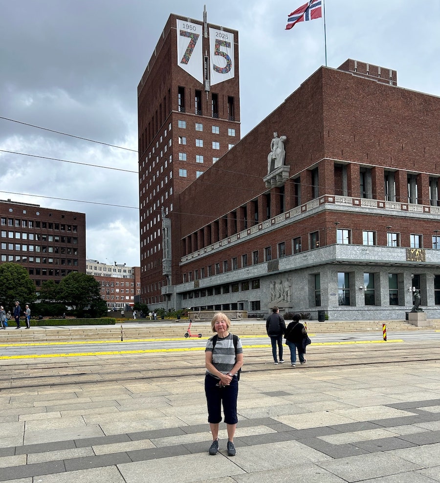 Vera at Oslo City Hall, celebrating its 75th year, during our 1-day in Oslo, Norway.