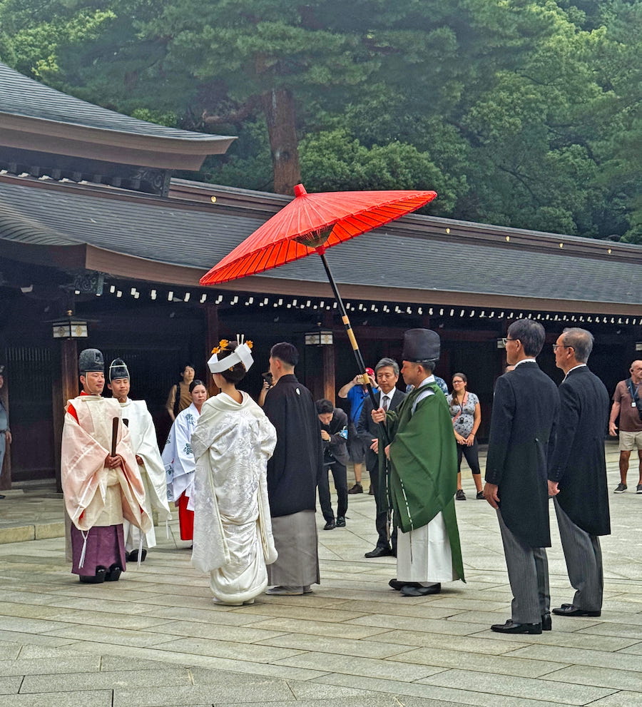 The bridal couple during the wedding ceremony at Meiji Shrine.