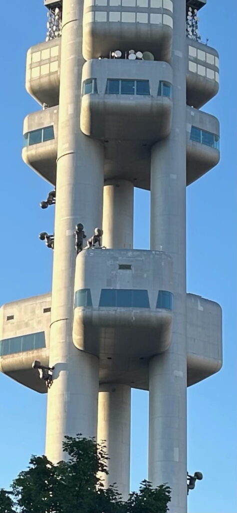David Cerny's statues of crawling babies climbing a TV Tower in the Zizkov, a neighbourhood of Prague, Czechia.