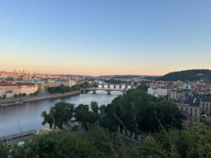 Views over the Vtlava River from Letna Park at sunset.