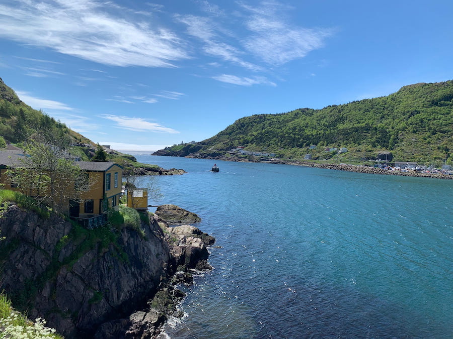 Looking across the harbour inlet to the lighthouse on the point at Fort Amherst.