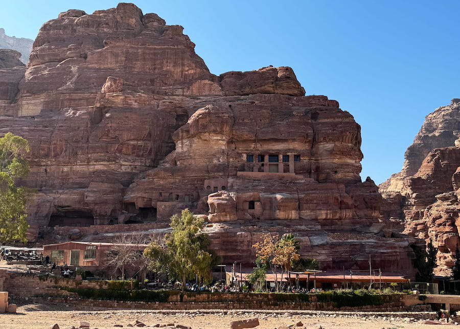 Modern restaurants in the centre of Petra contrast with the remnants of centuries old history with dwelling carved into the stone cliffs.