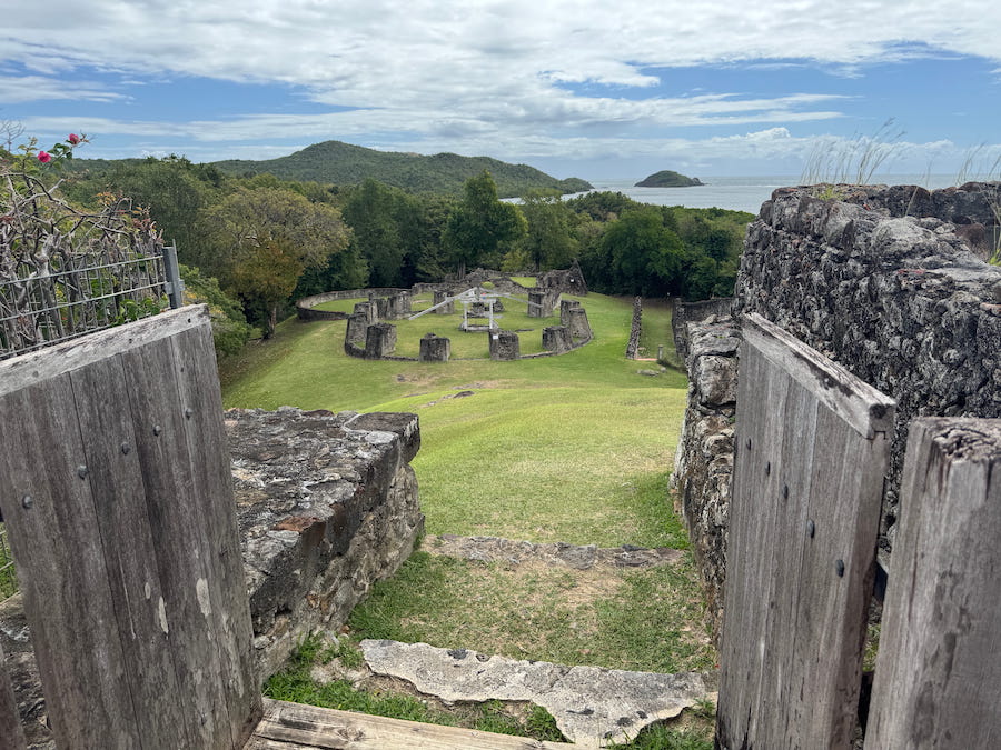 The ruins of the sugar mill stand like an ancient stone circle on the headland Chateau Dubuc.