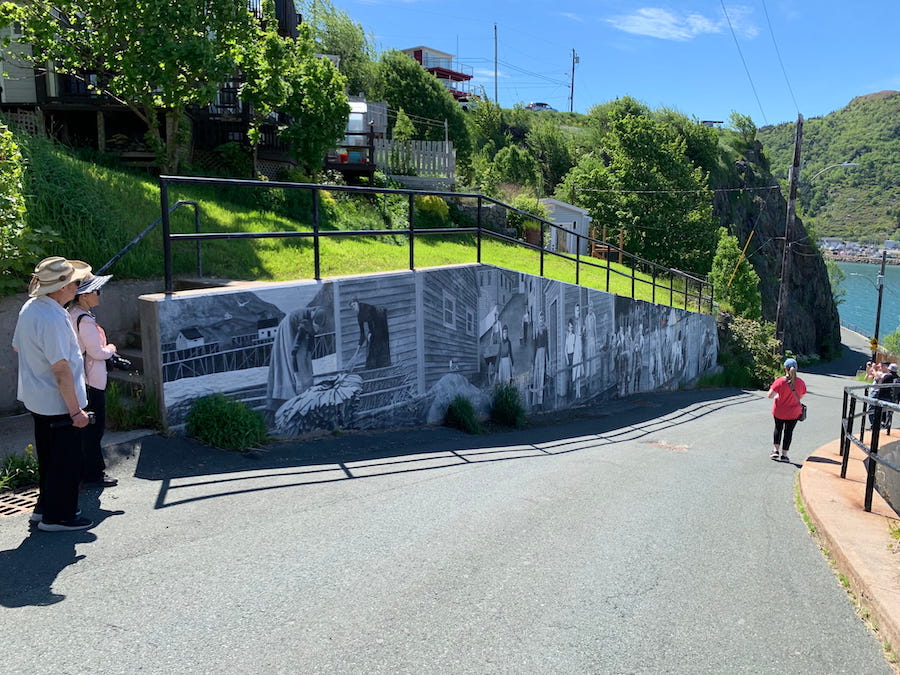 St. John's history murals line the roadway going down to the harbour.
